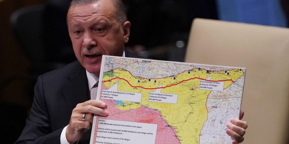 Turkey's President Recep Tayyip Erdogan holds up a map as he speaks during the 74th Session of the United Nations General Assembly at UN Headquarters in New York, September 24, 2019. (Photo by TIMOTHY A. CLARY / AFP)